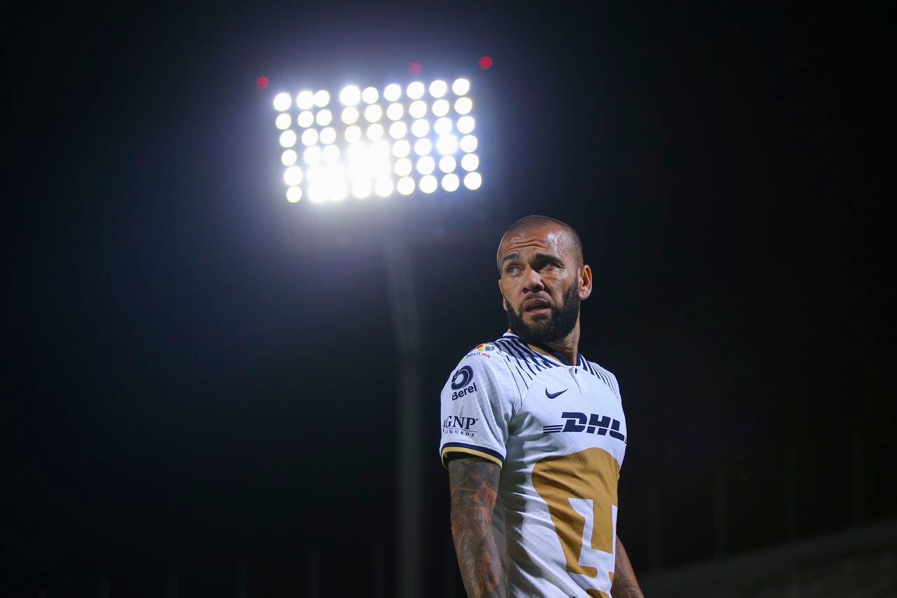 MEXICO CITY, MEXICO - SEPTEMBER 07: Dani Alves of Pumas looks on during the 13th round match between Pumas UNAM and Queretaro as part of the Torneo Apertura 2022 Liga MX at Olimpico Universitario Stadium on September 07, 2022 in Mexico City, Mexico. (Photo by Agustin Cuevas/Getty Images)