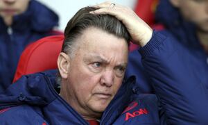 FILE - Manchester United's manager Louis van Gaal adjusts his hair as he waits for the start of the English Premier League soccer match between Sunderland and Manchester United at the Stadium of Light, Sunderland, England, Saturday, Feb. 13, 2016. Netherlands soccer coach Louis van Gaal has revealed that he is being treated for an aggressive form of prostate cancer but still plans to lead the team at the World Cup in Qatar in November. (AP Photo/Scott Heppell)
