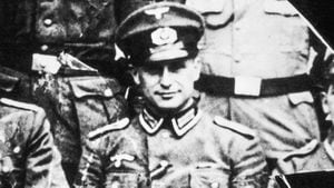 German SS officer and Nazi war criminal Klaus Barbie (1913 - 1991) in army NCO uniform, 1944. After the war, Barbie worked for British and American intelligence services before going into hiding in Bolivia in 1955. He was arrested for war crimes in 1984 and sentenced to life imprisonment in 1987. (Photo by Gabriel Hackett/Hulton Archive/Getty Images)