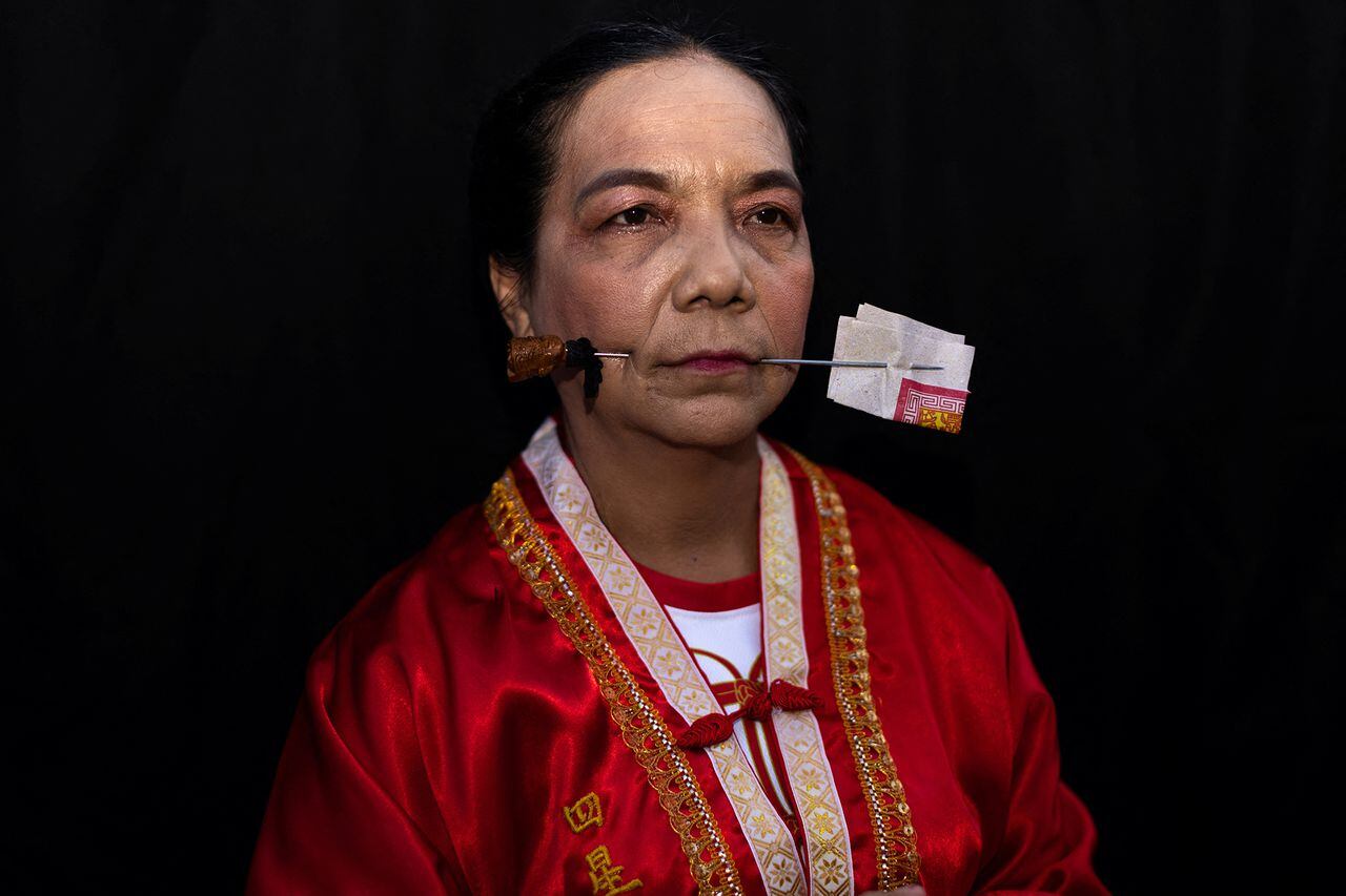 En imágenes : Retratos del festival vegetariano taoísta en Phuket