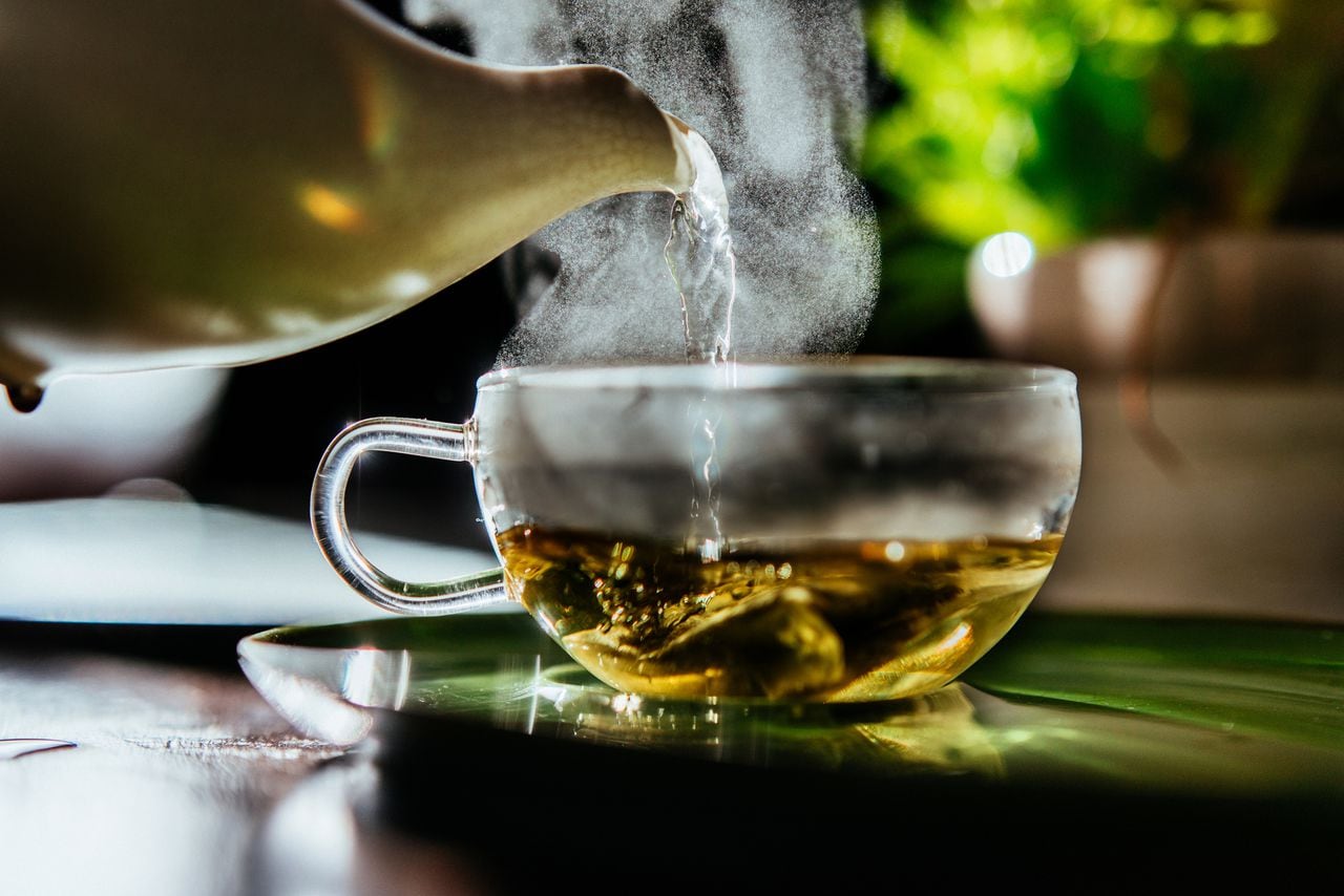 Fresh hot water for organic sage herbal tea at teatime.