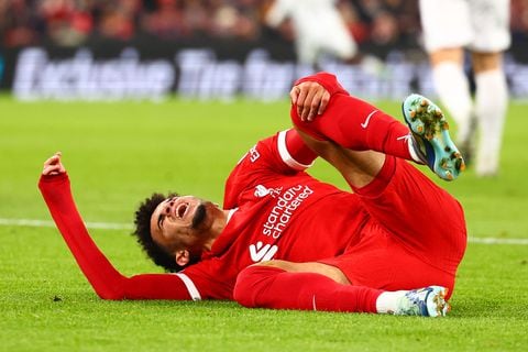 LIVERPOOL, ENGLAND - NOVEMBER 30: Luis Diaz of Liverpool lies injured during the during the UEFA Europa League Group E match between Liverpool and LASK at Anfield on November 30, 2023 in Liverpool, England. (Photo by Chris Brunskill/Fantasista/Getty Images)
