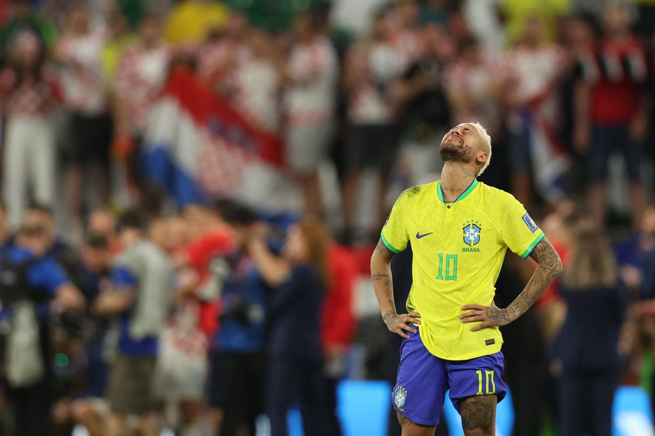 Brazil's forward #10 Neymar reacts after his team lost the Qatar 2022 World Cup quarter-final football match between Croatia and Brazil at Education City Stadium in Al-Rayyan, west of Doha, on December 9, 2022. (Photo by Adrian DENNIS / AFP)