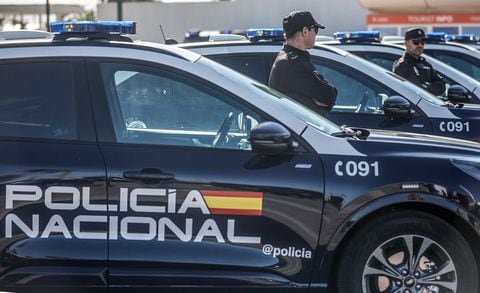 VALENCIA, SPAIN - NOVEMBER 02: Several agents of the National Police during the incorporation of 21 uniformed SUV type vehicles, model Ford Kuga Hybrid, at the Antonio Ferrandis Esplanade of Paseo de Neptuno, on 02 November, 2023 in Valencia, Valencian Community, Spain. The new 21 semi-electric cars that will patrol the streets of Valencia were presented today. They are part of a batch of 334 Ford Kuga H, leased in a contract tendered for 14.7 million euros and won by the BMW Group.