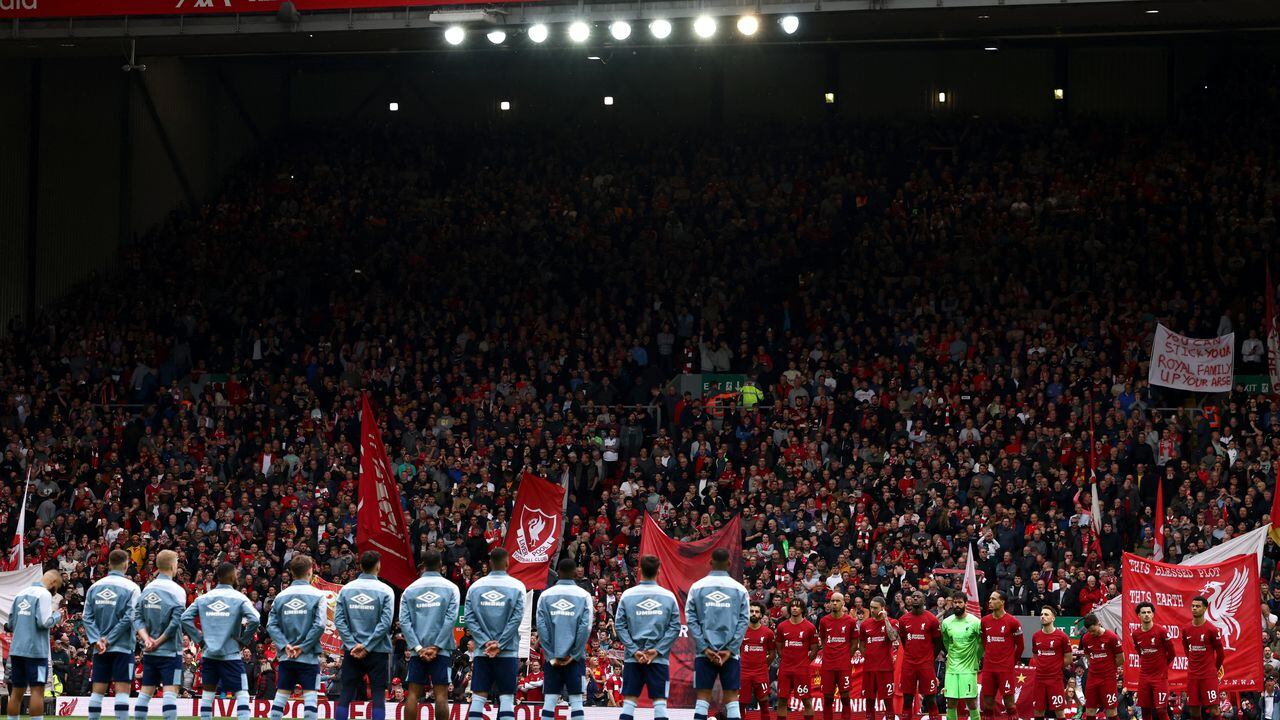 Players sing the national anthem prior to the English Premier League football match between Liverpool and Brentford at Anfield in Liverpool, north west England on May 6, 2023. (Photo by Darren Staples / AFP) / RESTRICTED TO EDITORIAL USE. No use with unauthorized audio, video, data, fixture lists, club/league logos or 'live' services. Online in-match use limited to 120 images. An additional 40 images may be used in extra time. No video emulation. Social media in-match use limited to 120 images. An additional 40 images may be used in extra time. No use in betting publications, games or single club/league/player publications. /