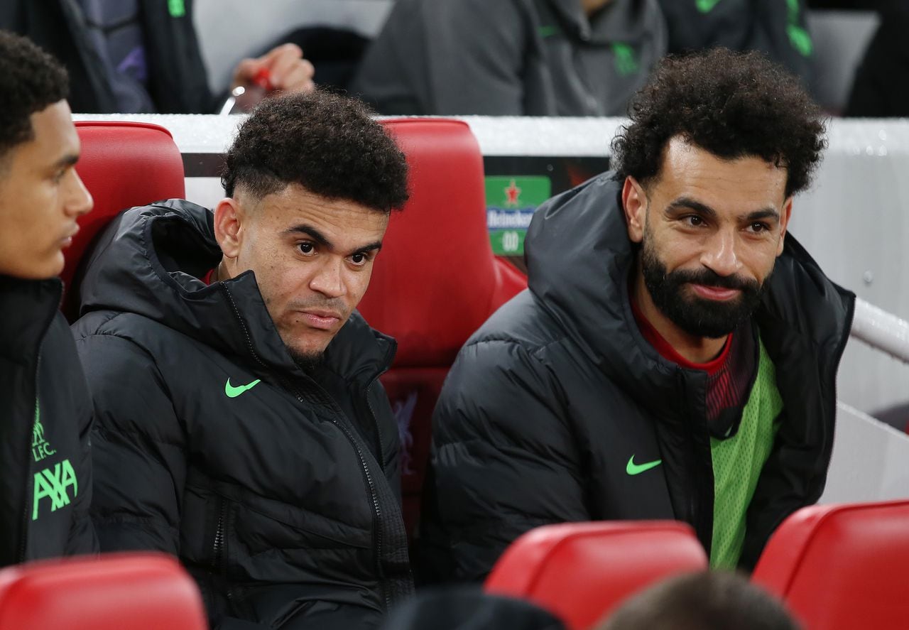 LIVERPOOL, ENGLAND - APRIL 11: Mohamed Salah and Luis Diaz of Liverpool on the substitute bench ahead of the UEFA Europa League 2023/24 Quarter-Final first leg match between Liverpool FC and Atalanta at Anfield on April 11, 2024 in Liverpool, England.(Photo by Crystal Pix/MB Media/Getty Images)