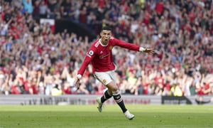 Manchester United's Cristiano Ronaldo celebrates after scoring his third goal during the English Premier League soccer match between Manchester United and Norwich City at Old Trafford stadium in Manchester, England, Saturday, April 16, 2022. (AP Photo/Jon Super)