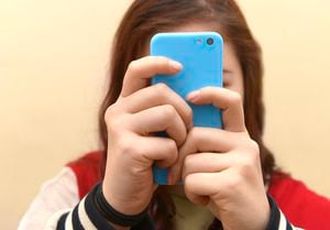 Close up of a teenager on her smartphone