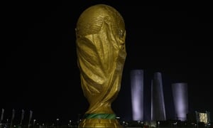 A replica of the World Cup is display outside Lusail Stadium in Lusail in Doha, Qatar, Saturday, Nov. 12, 2022. Final preparations are being made for the soccer World Cup which starts on Nov. 20 when Qatar face Ecuador. (AP Photo/Hassan Ammar)