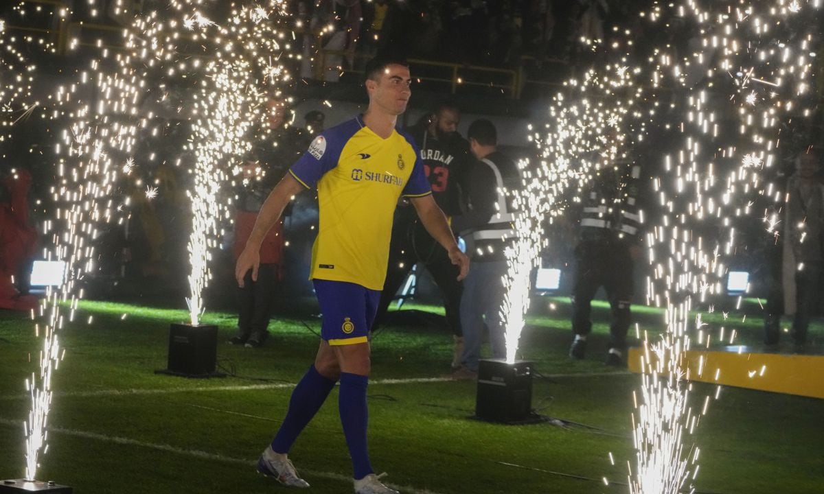 Cristiano Ronaldo walks during his official unveiling as a new member of Al Nassr soccer club in in Riyadh, Saudi Arabia, Tuesday, Jan. 3, 2023. Ronaldo, who has won five Ballon d'Ors awards for the best soccer player in the world and five Champions League titles, will play outside of Europe for the first time in his storied career. (AP/Amr Nabil)