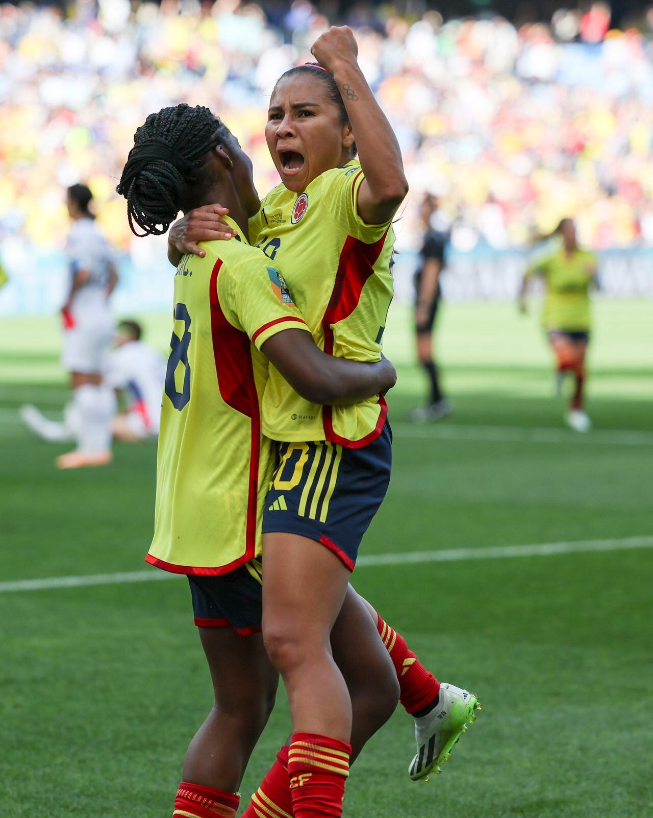 Colombia's Linda Caicedo celebrates with teammate Leicy Santos after Caicedo scored her first goal during the Women's World Cup Group H soccer match between Colombia and South Korea at Sydney Football Stadium in Sydney, Australia, Tuesday, July 25, 2023. (AP Photo/Sophie Ralph)