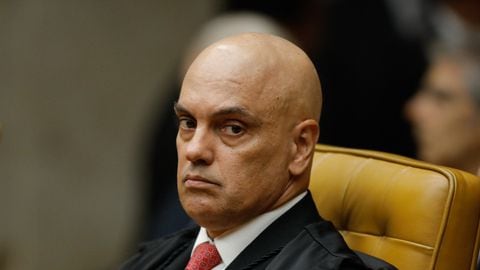 (FILES) Brazilian Supreme Court judge Alexandre de Moraes attends the solemn opening session of the 2024 judicial year in Brasilia on February 1, 2024. A Supreme Court judge in Brazil ordered an investigation of Elon Musk on April 7, 2024, after the mogul criticized the magistrate and accused him of censorship for blocking accounts suspected of spreading disinformation. In an order seen by AFP, Judge Alexandre de Moraes accused the owner of X, formerly Twitter, of "criminal instrumentalization of X." (Photo by Sergio Lima / AFP)
