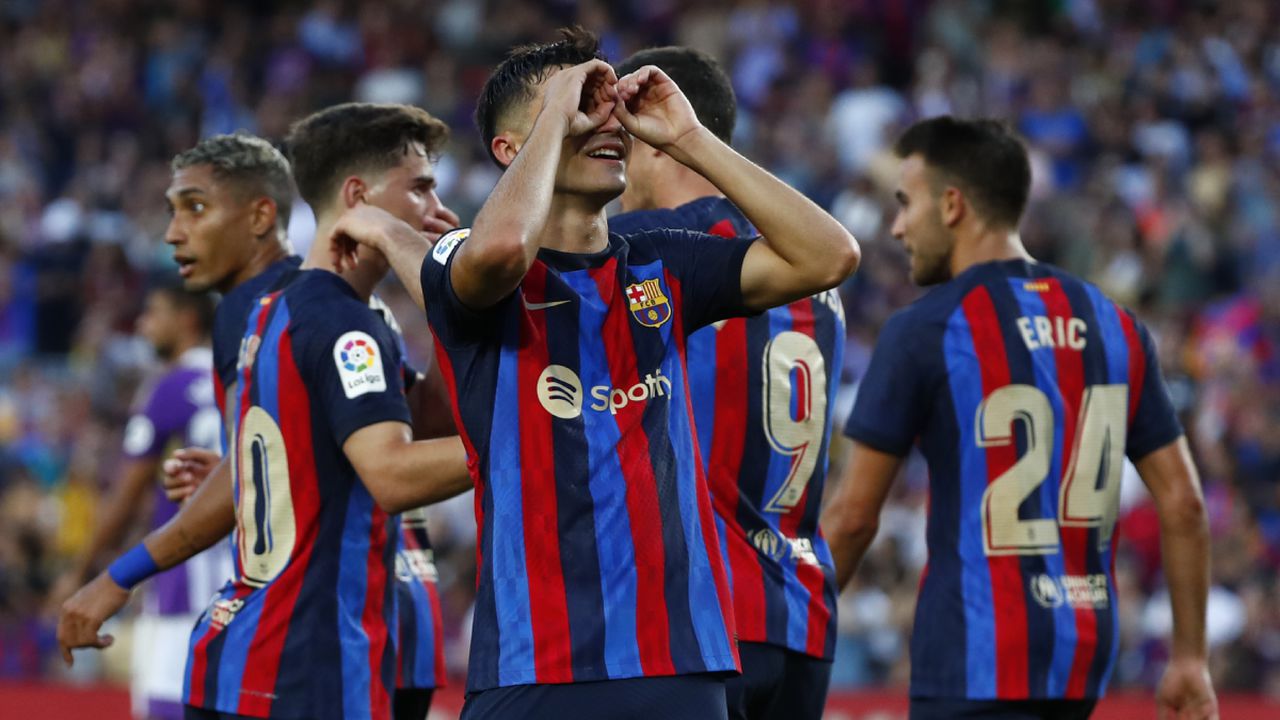 Barcelona's Pedri celebrates after scoring his side's second goal during a Spanish La Liga soccer match between FC Barcelona and Valladolid CF at the Camp Nou stadium in Barcelona, Spain, Sunday, Aug. 28, 2022. (AP/Joan Monfort)