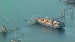 An aerial view of the Dali cargo vessel which crashed into the Francis Scott Key Bridge causing it to collapse in Baltimore, Maryland, U.S., March 26, 2024, in this still image taken from a video.  ABC AFFILIATE WJLA via REUTERS.  THIS IMAGE HAS BEEN SUPPLIED BY A THIRD PARTY NO RESALES. NO ARCHIVES. MANDATORY CREDIT.