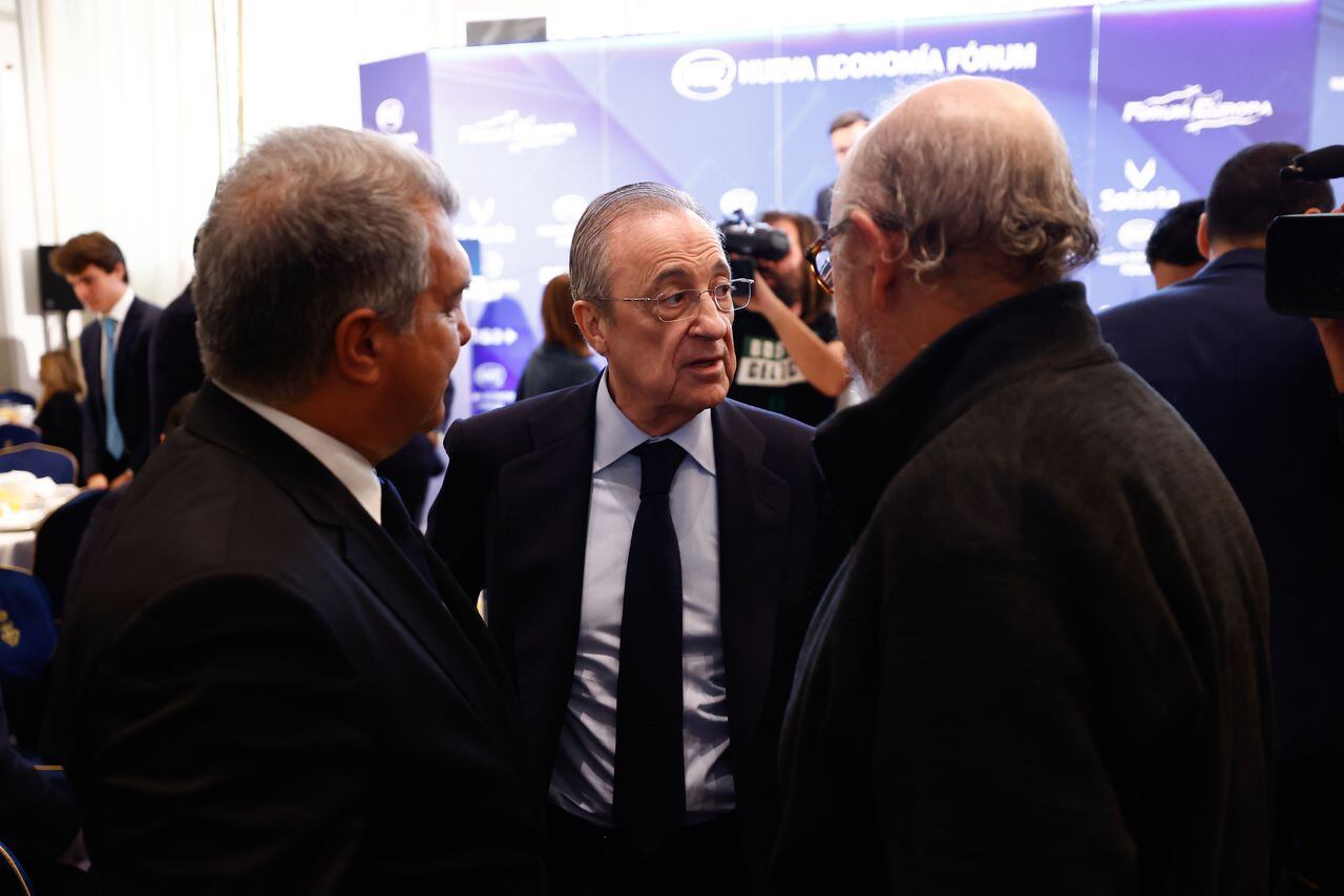 MADRID, SPAIN - DECEMBER 16: Florentino Perez, President of Real Madrid, and Joan Laporta, President of FC Barcelona, talks to Jaume Roures, President of MediaPro, during the Desayuno Informativo del Forum Europa with Bernd Reichart about Superliga celebrated at Hotel Ritz on december 16, 2022, in Madrid, Spain. (Photo By Oscar J. Barroso/Europa Press via Getty Images)