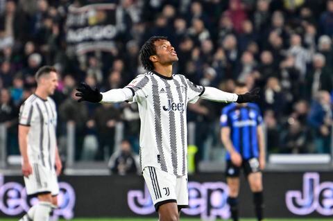 TURIN, ITALY - APRIL 04: Juan Cuadrado of Juventus FC celebrates after scoring the team's first goal during the Coppa Italia match between Juventus and FC Internazionale at Allianz Stadium on April 04, 2023 in Turin, Italy. (Photo by Diego Puletto/Getty Images)