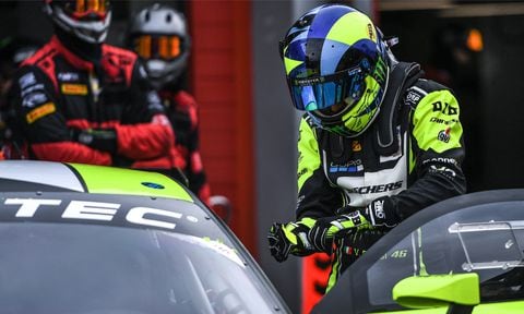 Nine-time MotoGP world champion, Valentino Rossi prepares to get into his Audi R8 Lms to compete in the Fanatec GT World Challenge Europe 2022 on April 03, 2022 at the Imola race track, Italy. Rossi has signed with Belgian team Wrt and will race an Audi R8 Lms, bearing the unmistakable number 46 in the Fanatec Challenge Europe championship.
AFP/Andrea SCIARRA