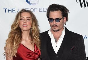 CULVER CITY, CA - JANUARY 09:  Amber Heard and Johnny Depp attend The Art of Elysium 2016 HEAVEN Gala presented by Vivienne Westwood & Andreas Kronthaler at 3LABS on January 9, 2016 in Culver City, California.  (Photo by C Flanigan/Getty Images)