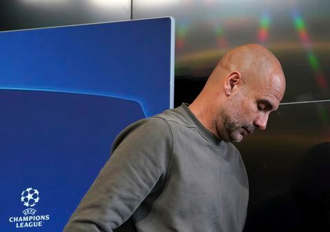 Manchester City manager Pep Guardiola leaves after a press conference ahead of Wednesday's Champions League, semifinal, return-leg soccer match against Real Madrid, at City Football Academy, Manchester, England, Tuesday May 16, 2023. (Martin Rickett/PA via AP)