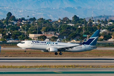 WestJet airlines Boeing 737-8CT arrives at Los Angeles International Airport