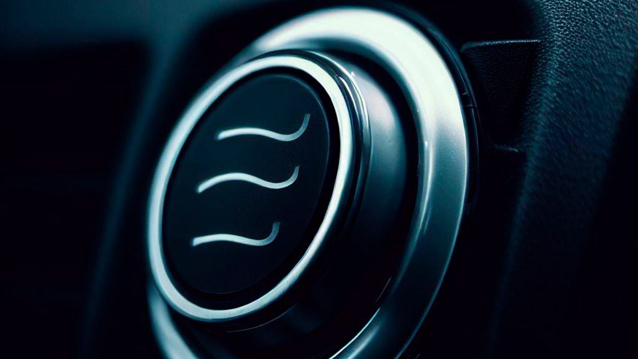 Ilustración del botón del sistema de recirculación de aire de un carro.