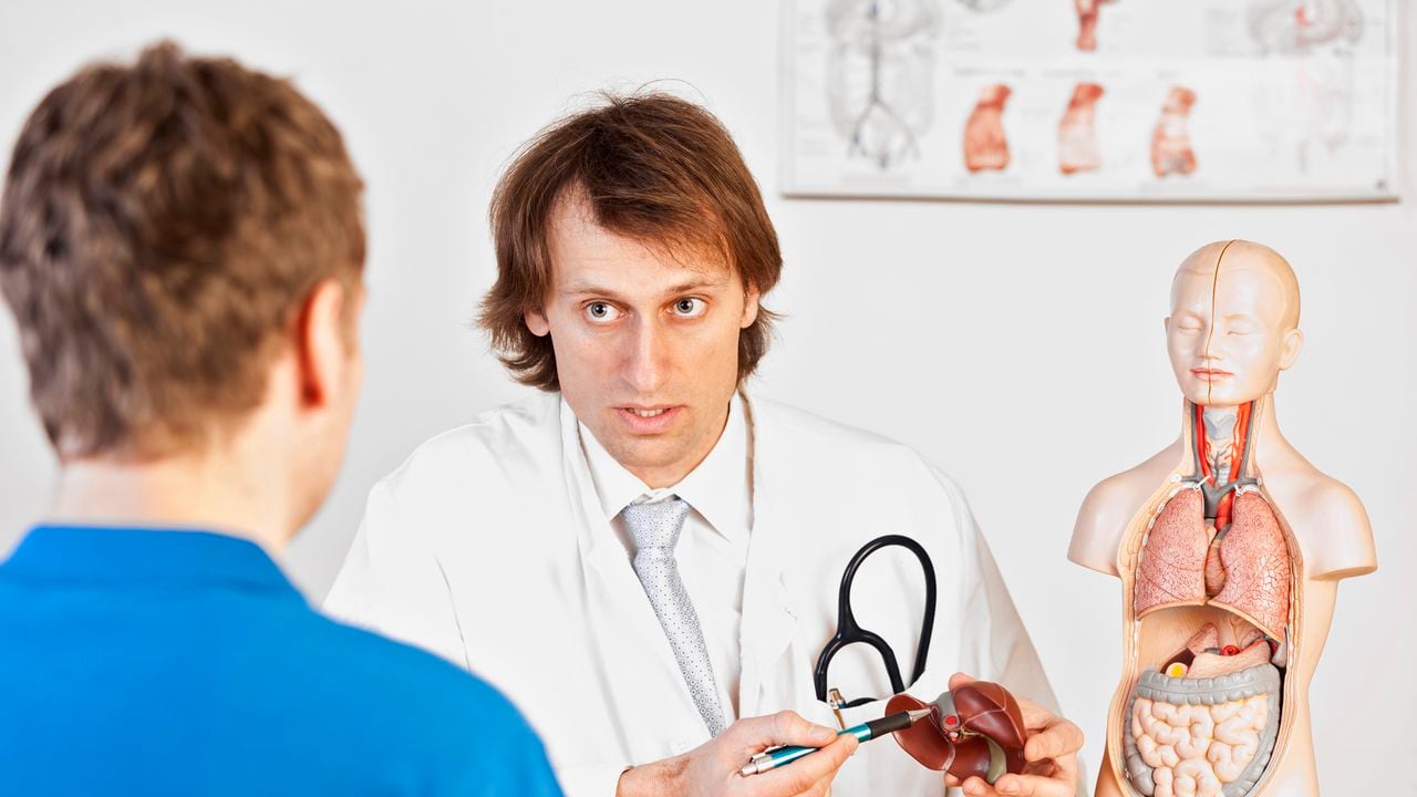 Doctor explaining liver problems