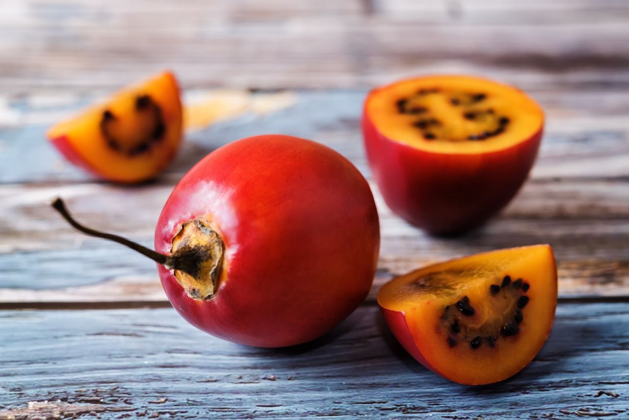 Ripe Tamarillo fruit with slices. toning. selective focus