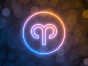 glowing neon sign of Aries with blurred bokeh background. suitable for zodiac, fate, religion, light and energy themes. 3d illustration