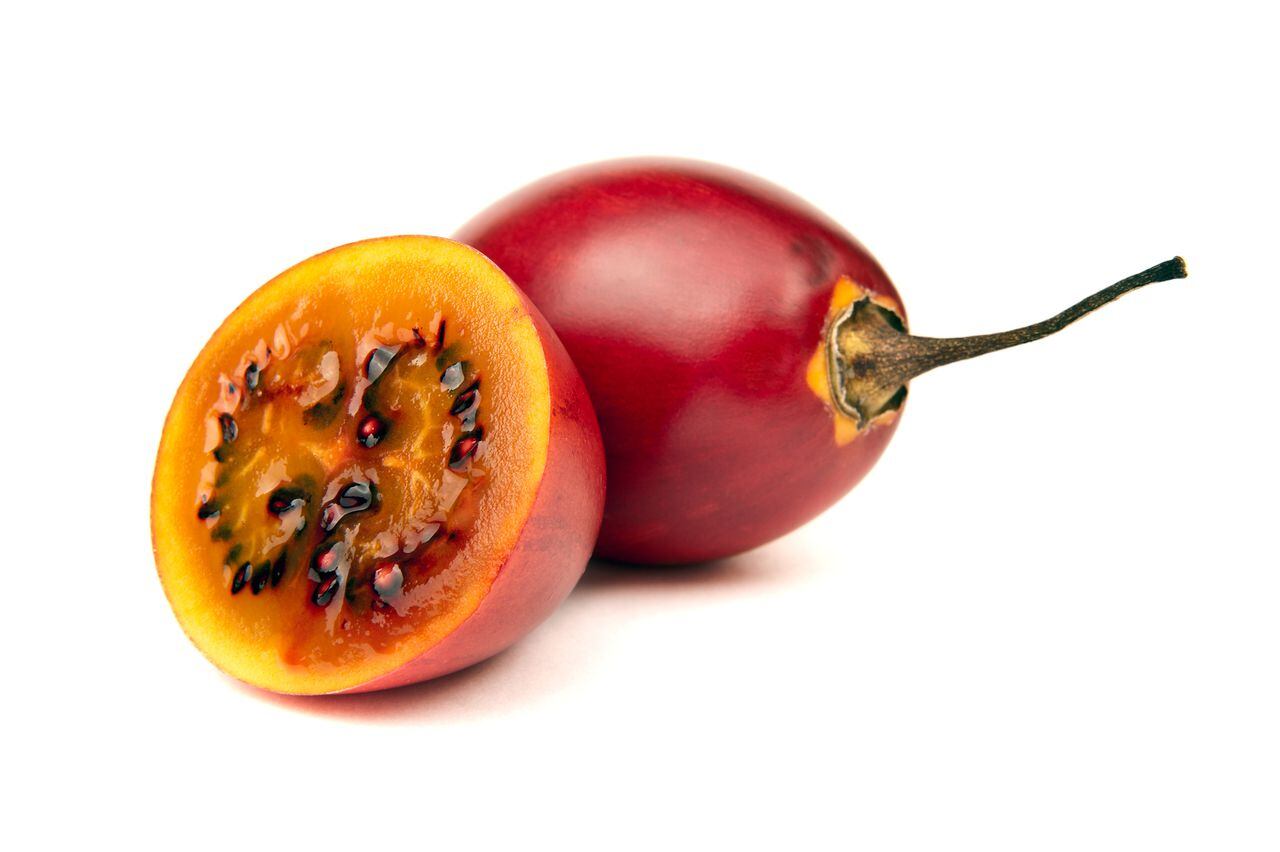 "Tamarillo, whole and cut half-and-half.Please see some similar pictures from my portfolio:"