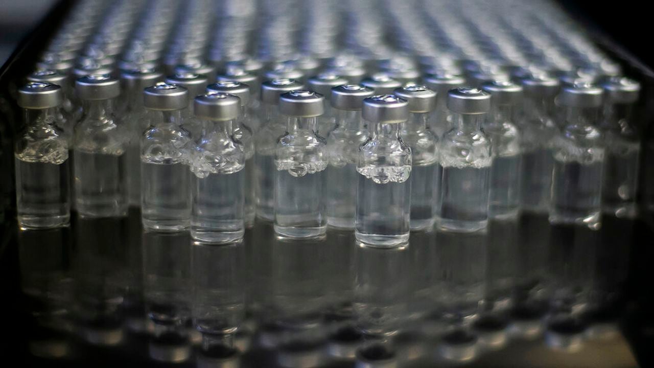 FILE - In this file photo dated Friday, Feb. 12, 2021, Doses of AstraZeneca vaccines for COVID-19 sit in vials at the Fiocruz Foundation after being bottled in Rio de Janeiro, Brazil. The World Health Organization Monday Feb. 15, 2021, granted an emergency authorization to the coronavirus vaccine made by AstraZeneca, a move that should allow its partners to ship millions of doses to countries worldwide as part of a U.N.-backed program to stop the pandemic.(AP Photo/Bruna Prado, FILE)