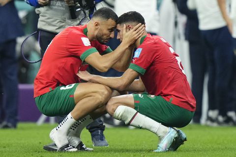 Romain Saïss centre-back of Morocco and Besiktas JK and Achraf Hakimi right-back of Morocco and Paris Saint-Germain  after losing the FIFA World Cup Qatar 2022 semi final match between France and Morocco at Al Bayt Stadium on December 14, 2022 in Al Khor, Qatar. (Photo by Jose Breton/Pics Action/NurPhoto via Getty Images)