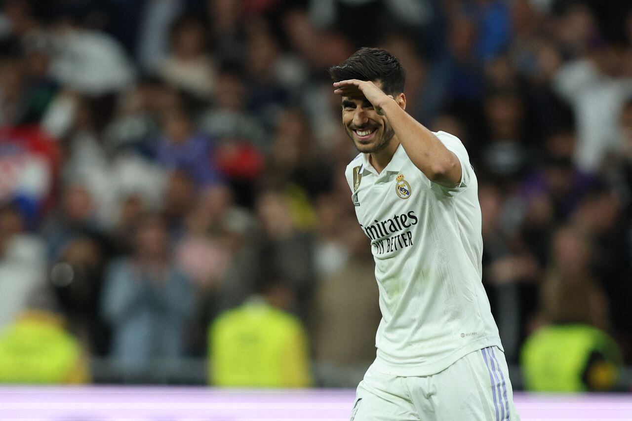 (FILES) Real Madrid's Spanish midfielder Marco Asensio celebrates scoring his team's first goal during the Spanish league football match between Real Madrid CF and RC Celta de Vigo at the Santiago Bernabeu stadium in Madrid on April 22, 2023. Real Madrid forward Marco Asensio confirmed on June 3, 2023 he is leaving the Spanish giants at the end of his contract in June. (Photo by Thomas COEX / AFP)
