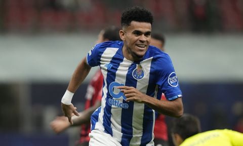 Porto's Luis Diaz celebrates after scoring his side's opening goal during the Champions League group B soccer match between AC Milan and Porto at the San Siro stadium in Milan, Italy, Wednesday, Nov. 3, 2021. (AP/Luca Bruno)