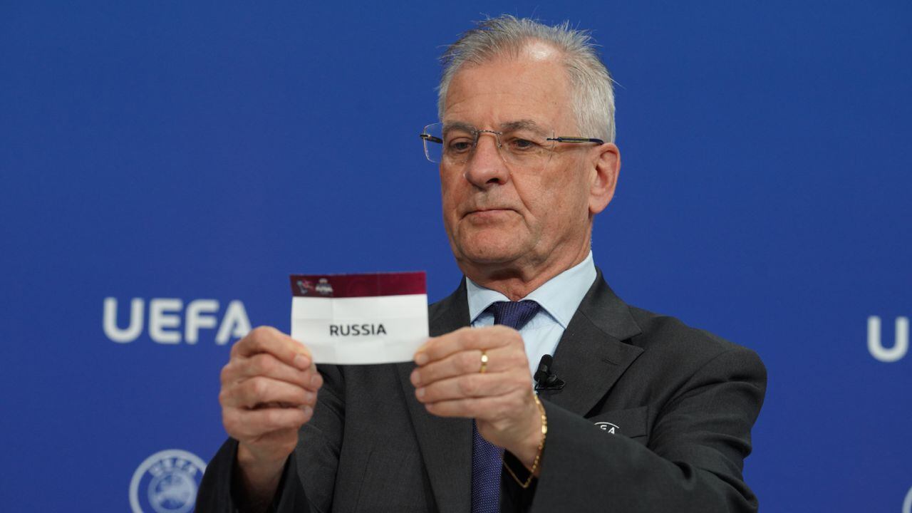 NYON, SWITZERLAND - FEBRUARY 18: UEFA Head of Youth and Futsal Claudio Negroni draws out the card of Russia during the UEFA Women's Futsal EURO 2022/23 Qualifying Draw at the UEFA headquarters, The House of European Football, on February 18, 2022, in Nyon, Switzerland. (Photo by Getty Images/Jean-Luc Aboeuf - UEFA)