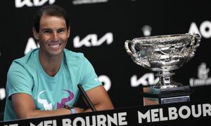 Rafael Nadal of Spain smiles during a press conference following his win over Daniil Medvedev of Russia in the men's singles final at the Australian Open tennis championships in Melbourne, Australia, early Monday, Jan. 31, 2022. (AP Photo/Simon Baker)