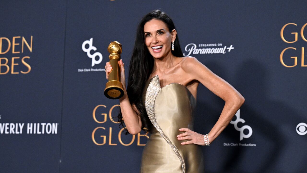 US actress Demi Moore poses with the Best Performance by a Female Actor in a Motion Picture � Musical or Comedy award for "The Substance" in the press room during the 82nd annual Golden Globe Awards at the Beverly Hilton hotel in Beverly Hills, California, on January 5, 2025. (Photo by Robyn Beck / AFP)