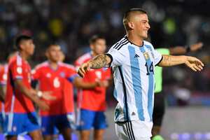 Argentina's Aaron Quiros celebrates after he scored his team's fourth goal against Chile during South America's under-23 pre-Olympic tournament soccer match at Misael Delgado stadium in Valencia, Venezuela, Tuesday, Jan. 30, 2024. (AP Photo/Matias Delacroix)