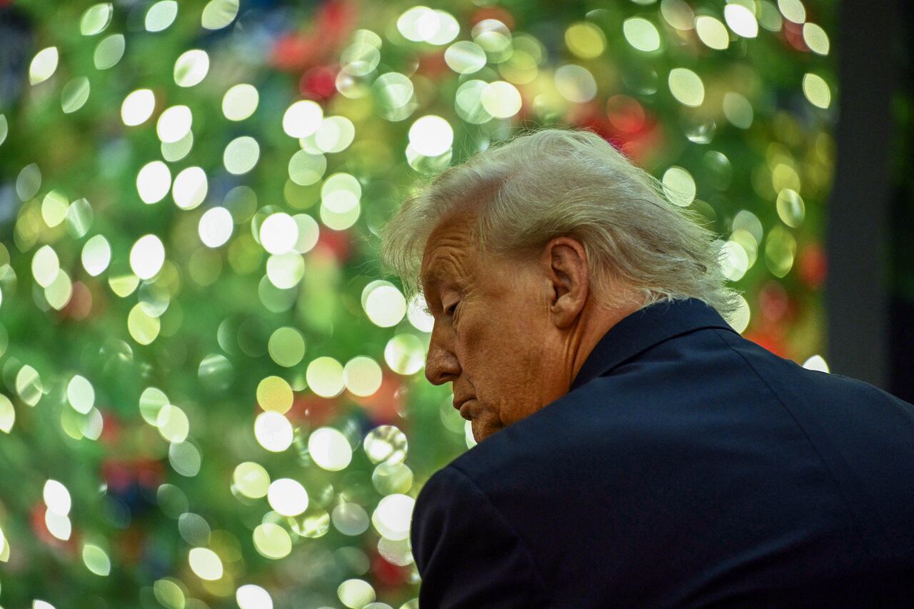 US President Donald Trump attends a concert by Andrea Bocelli in the East Room of the White House in Washington, DC on December 5, 2025. (Photo by Brendan SMIALOWSKI / AFP)