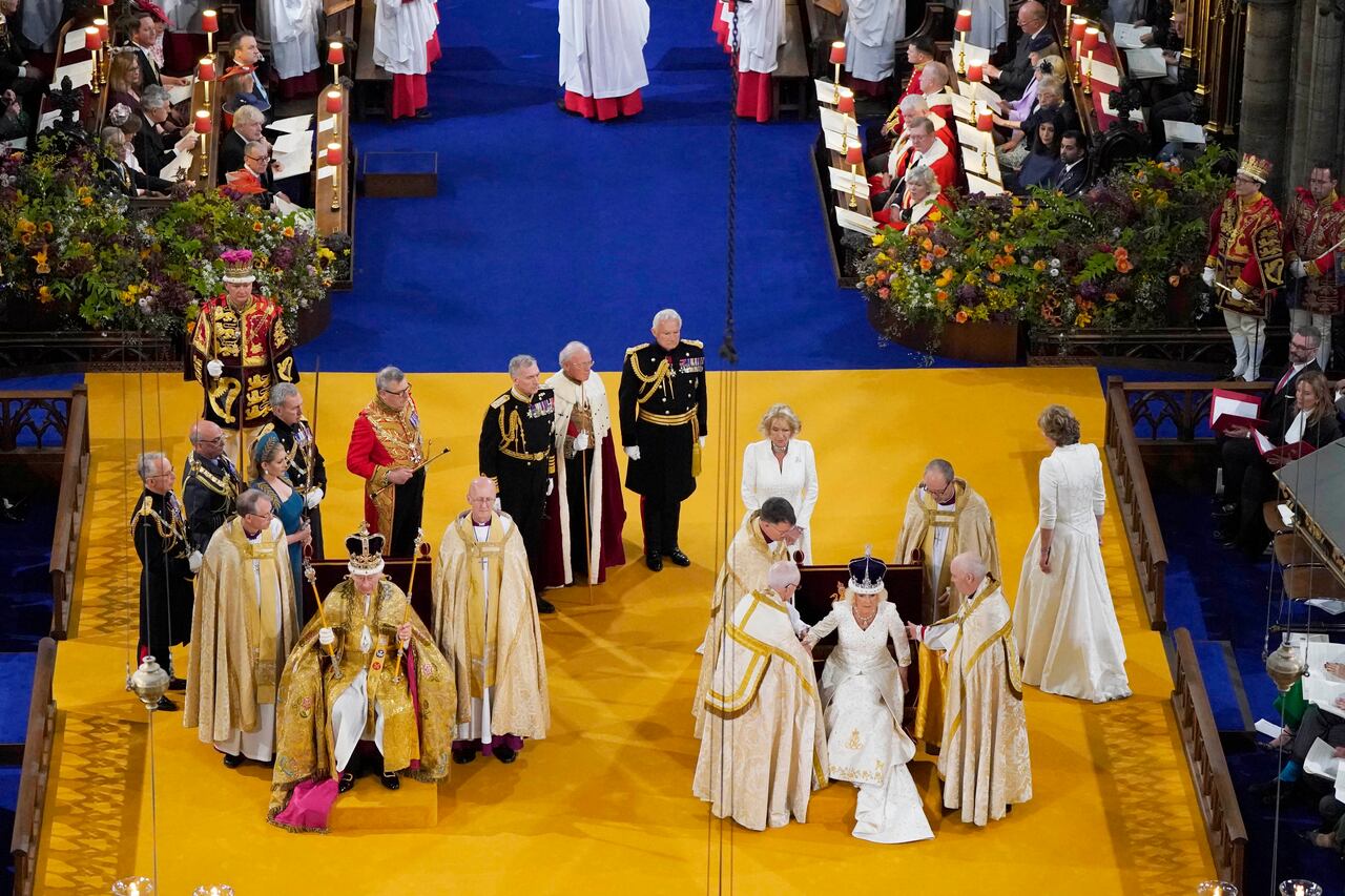 LONDON, ENGLAND - MAY 06: King Charles III and Queen Camilla after being crowned during their coronation ceremony in Westminster Abbey, on May 6, 2023 in London, England. The Coronation of Charles III and his wife, Camilla, as King and Queen of the United Kingdom of Great Britain and Northern Ireland, and the other Commonwealth realms takes place at Westminster Abbey today. Charles acceded to the throne on 8 September 2022, upon the death of his mother, Elizabeth II. (Photo by Andrew Matthews - WPA Pool/Getty Images)