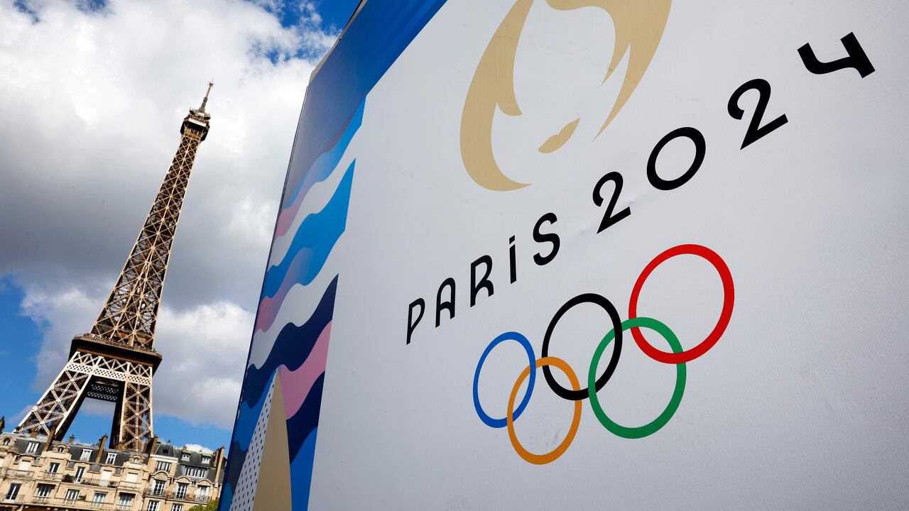PARIS, FRANCE - APRIL 21: The Paris 2024 logo, representing the Olympic Games is displayed near the Eiffel Tower three months prior to the start of the Paris 2024 Olympic and Paralympic games on April 21, 2024 in Paris, France. The city is gearing up to host the XXXIII Olympic Summer Games, from 26 July to 11 August. (Photo by Chesnot/Getty Images)
