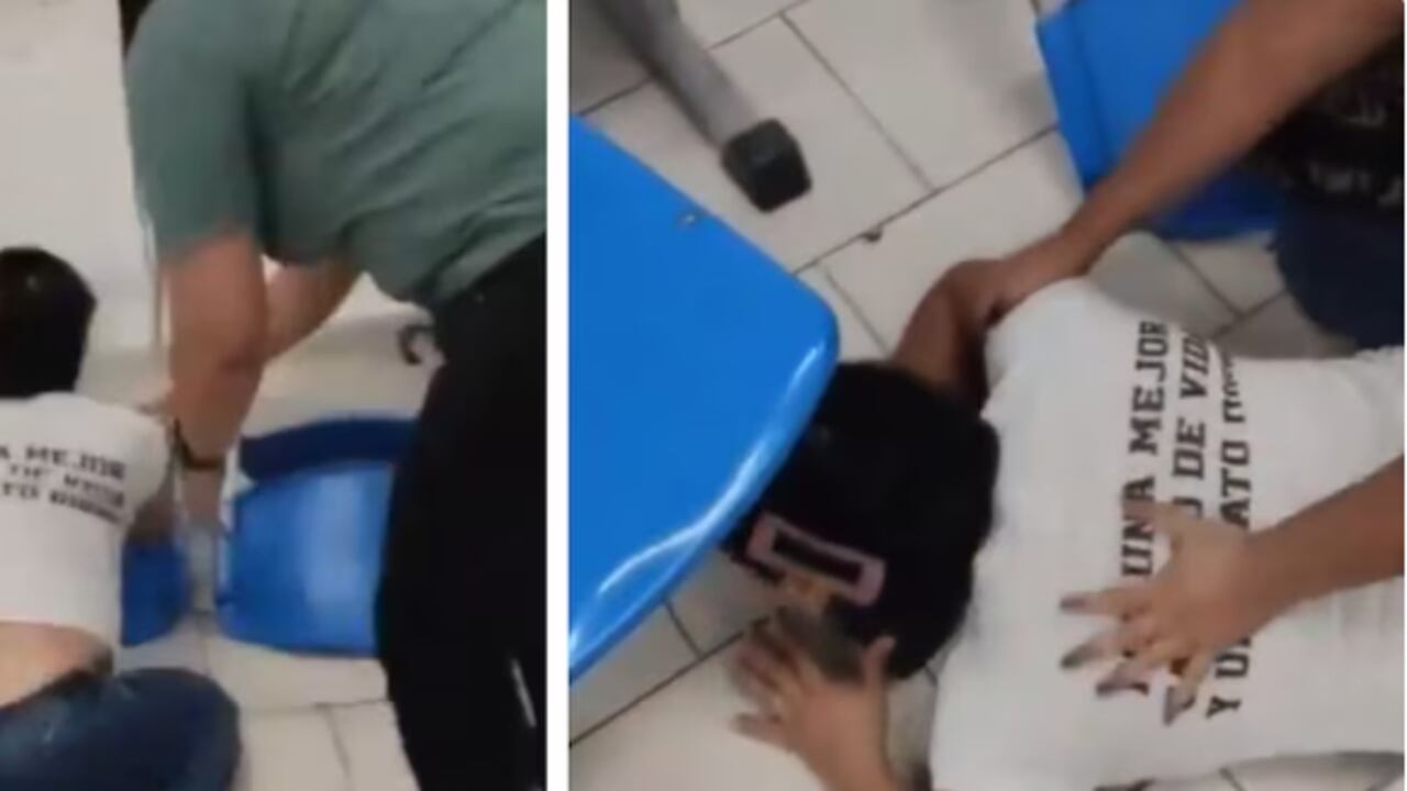 La mujer desesperada se tendió en el piso y tiró sillas en las instalaciones de la EPS Emssanar en Cali.