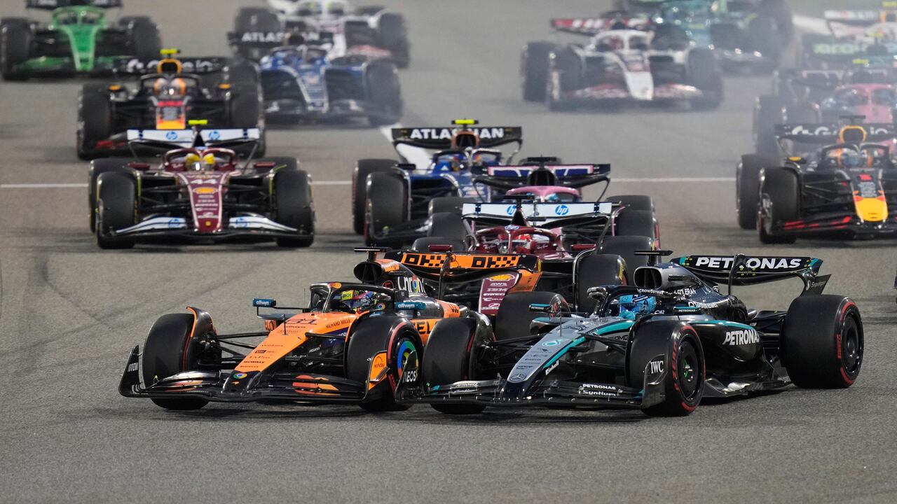 McLaren driver Oscar Piastri of Australia leadsin front of Mercedes driver George Russell of Britain at the start of the the Formula One Bahrain Grand Prix, in Sakhir, Sunday, April 13, 2025. (AP Photo/Darko Bandic)
