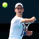 FILE PHOTO: Serbian tennis player Novak Djokovic practices on Rod Laver Arena ahead of the 2022 Australian Open at Melbourne Park, in Melbourne, Australia, January 11, 2022. Kelly Defina/Pool via REUTERS/File Photo