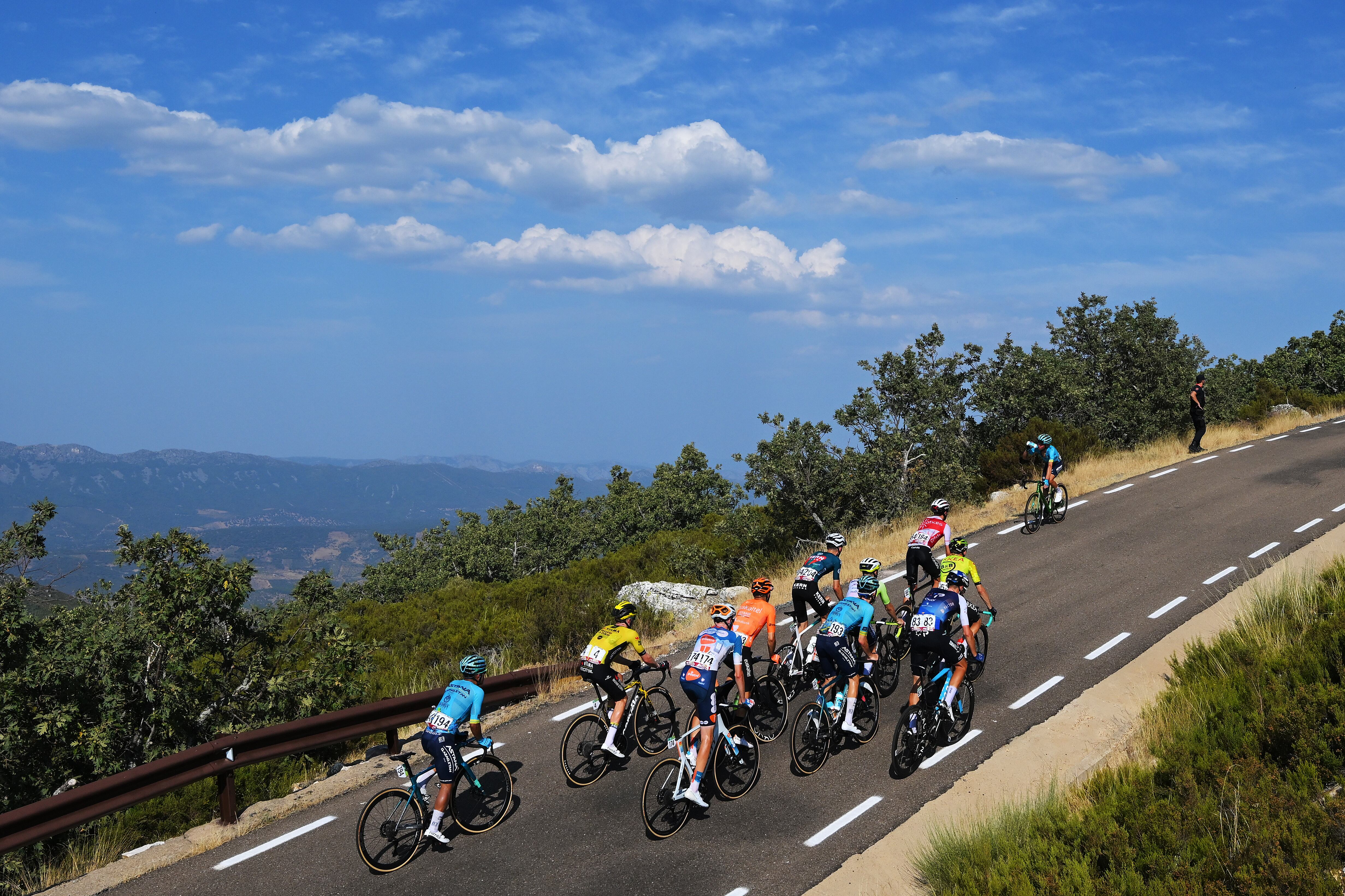 PICO VILLUERCAS, SPAIN - AUGUST 20: A general view of Harold Tejada of Colombia and Team Astana Qazaqstan, Gijs Leemreize of The Netherlands and Team dsm-Firmenich PostNL, Marco Frigo of Italy and Team Israel - Premier Tech, Gianmarco Garofoli of Italy and Team Astana Qazaqstan and Laurens Huys of Belgium and Team Arkea B/B Hotels compete during the La Vuelta - 79th Tour of Spain 2024, Stage 4 a 170.5km stage from Plasencia to Pico Villuercas 1544m / #UCIWT / on August 20, 2024 in Pico Villuercas, Spain. (Photo by Tim de Waele/Getty Images)