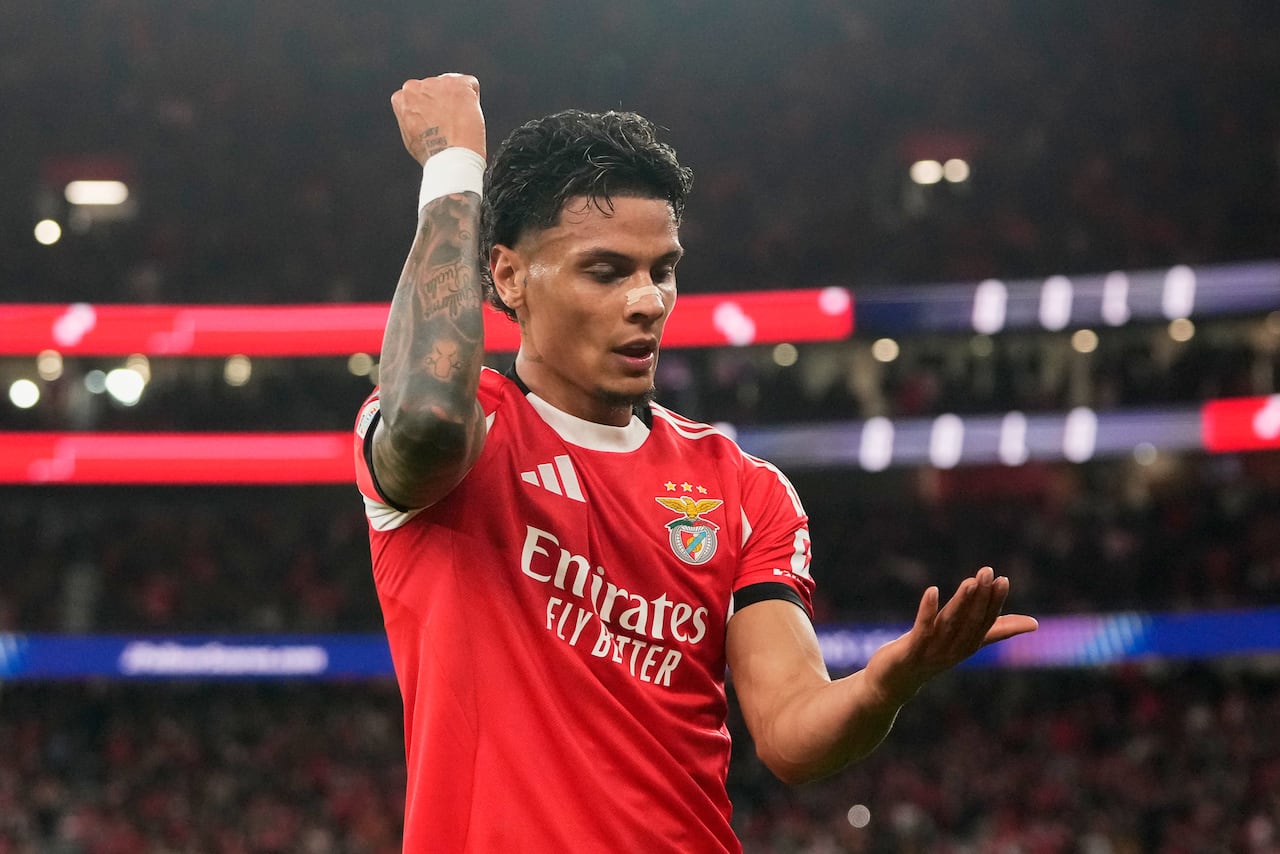 Benfica's Richard Rios celebrates after scoring his side's first goal during a Champions League opening phase soccer match between SL Benfica and Napoli in Lisbon, Wednesday, Dec. 10, 2025. (AP Photo/Armando Franca)