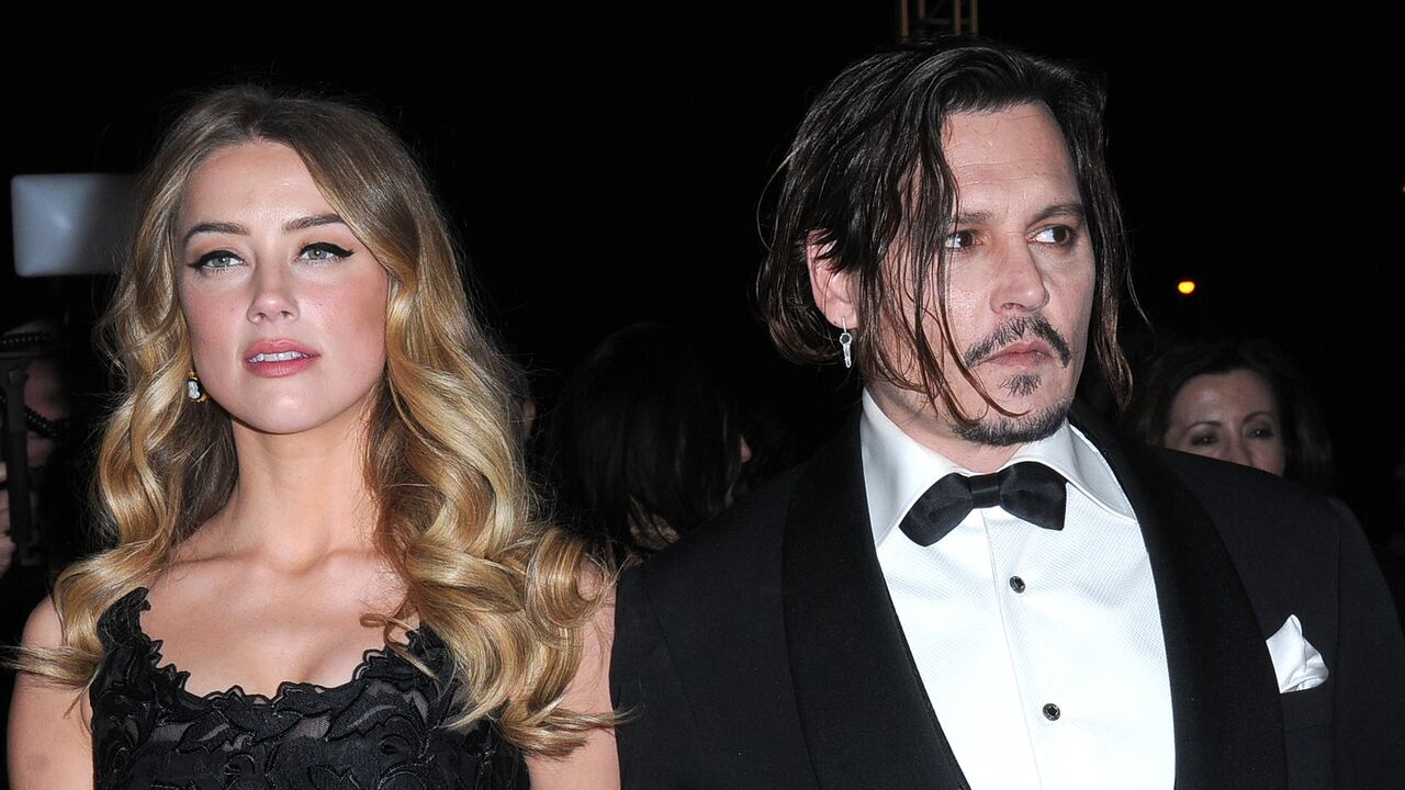 Amber Heard y el actor Johnny Depp. (Photo by Barry King/Getty Images)