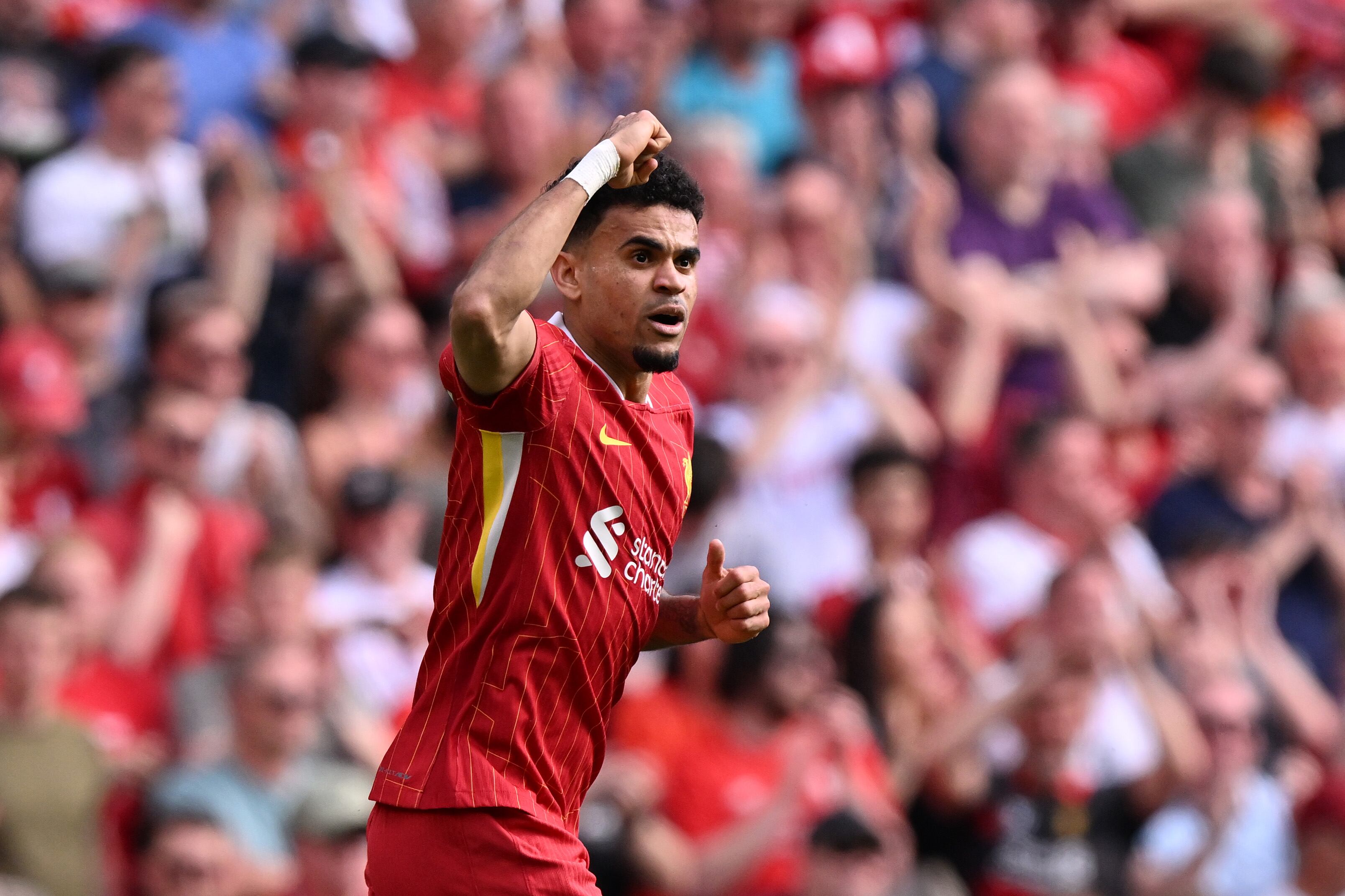 LIVERPOOL, ENGLAND - MAY 11:  (SUN OUT, SUN ON SUNDAY OUT) Luis Diaz of Liverpool celebrates scoring his team's second goal during the Premier League match between Liverpool FC and Arsenal FC at Anfield on May 11, 2025 in Liverpool, England. (Photo by Liverpool FC/Liverpool FC via Getty Images)