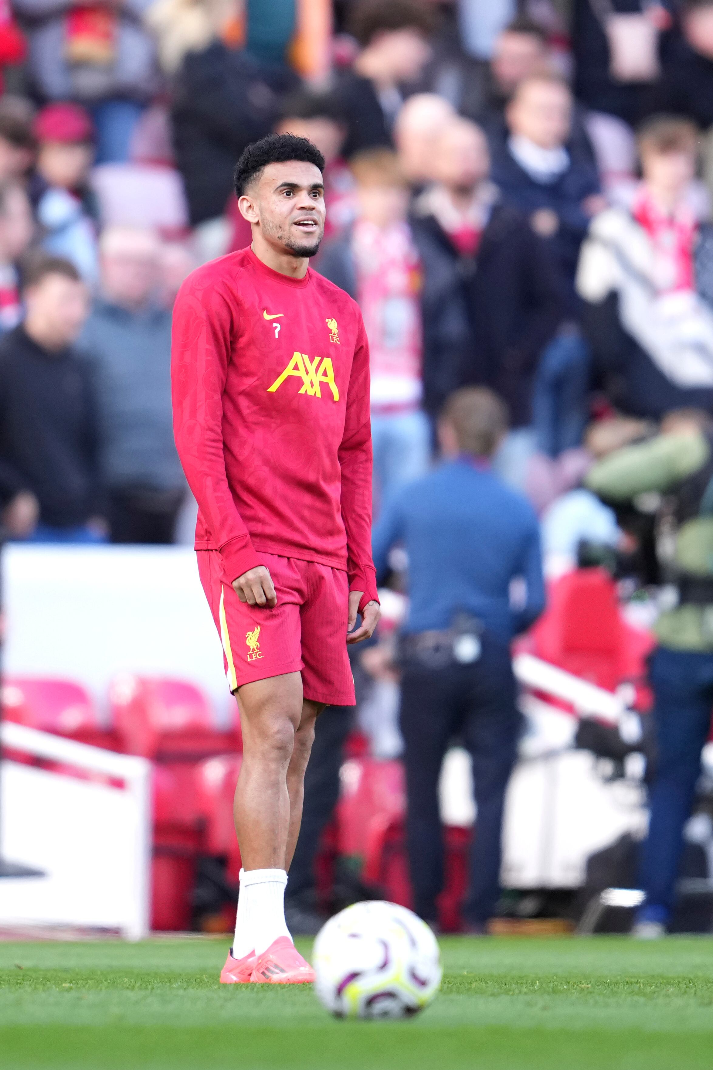 Liverpool's Luis Diaz warms up prior to the English Premier League soccer match between Liverpool and Chelsea at Anfield Stadium, Liverpool, England, Sunday, Oct. 20, 2024. (AP Photo/Jon Super)