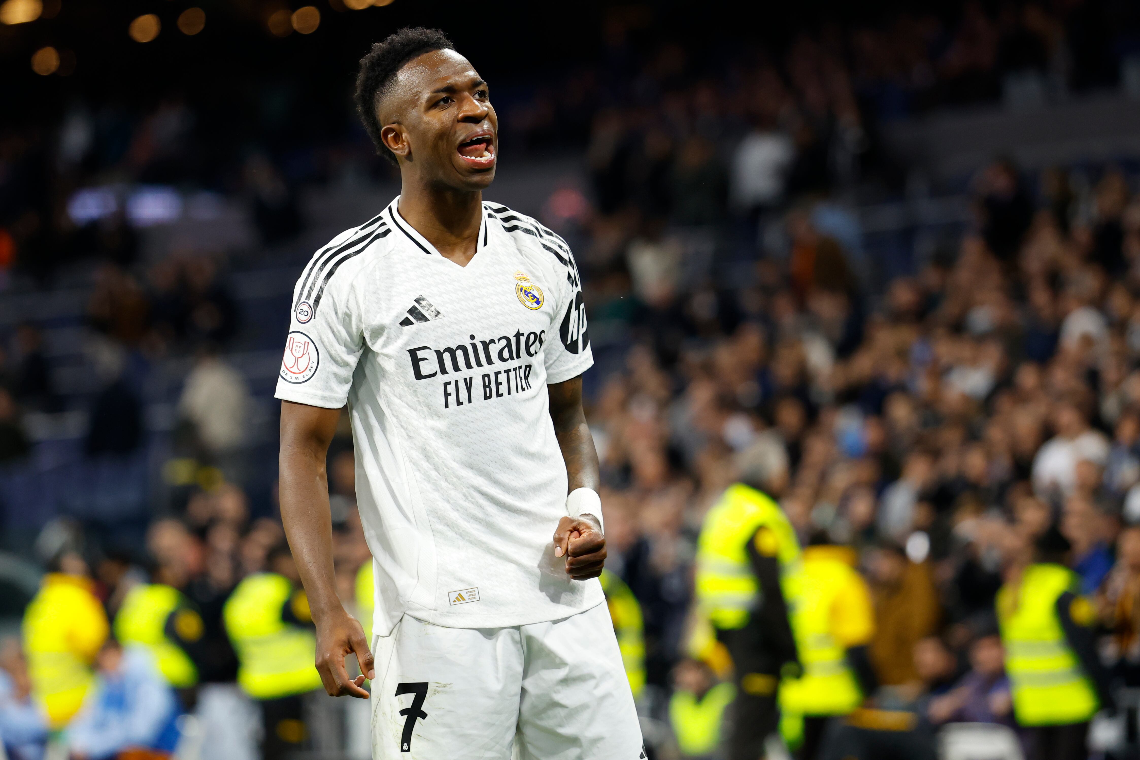Real Madrid's Vinicius Junior celebrates after scoring his side's 2nd goal against Celta de Vigo during a Copa del Rey round of 16 soccer match at the Santiago Bernabeu stadium in Madrid, Spain, Thursday, Jan. 16, 2025. (AP Photo/Pablo Garcia)