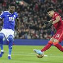 Liverpool's Luis Diaz, right, challenges for the ball with Leicester's Daniel Amartey during the English Premier League soccer match between Liverpool and Leicester City at Anfield stadium in Liverpool, England, Thursday, Feb. 10, 2022. (AP Photo/Jon Super)